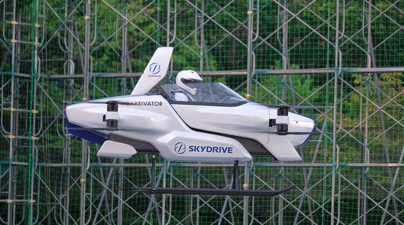 This photo taken at the beginning of August and released by ©SkyDrive/CARTIVATOR 2020 shows a test flight of a manned "flying car" at Toyota Test Field in Toyota, central Japan. Japan’s SkyDrive Inc., among myriads of “flying car” projects around the world, has carried out a successful-though-modest test flight with one person aboard.
