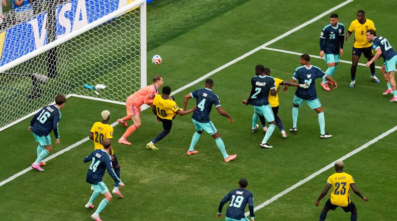 Ecuador's Gonzalo Plata (19) scores a go-ahead goal on Germany goalkeeper Manuel Neuer during the World Cup Group E soccer match in East Rutherford, N.J., near New York, Thursday, June 25, 2026. (AP Photo/Seth Wenig)