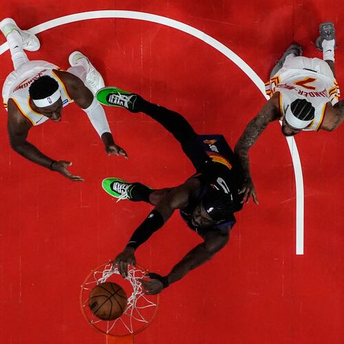 Phoenix Suns center Mark Williams (15) shoots against the Atlanta Hawks during the first half of an NBA basketball game, Friday, Jan. 23, 2026, in Atlanta. (Mike Stewart/AP)