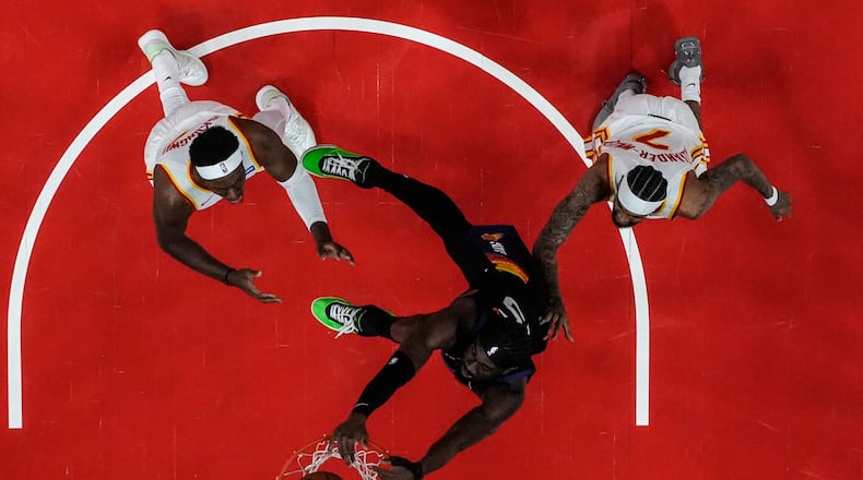 Phoenix Suns center Mark Williams (15) shoots against the Atlanta Hawks during the first half of an NBA basketball game, Friday, Jan. 23, 2026, in Atlanta. (Mike Stewart/AP)