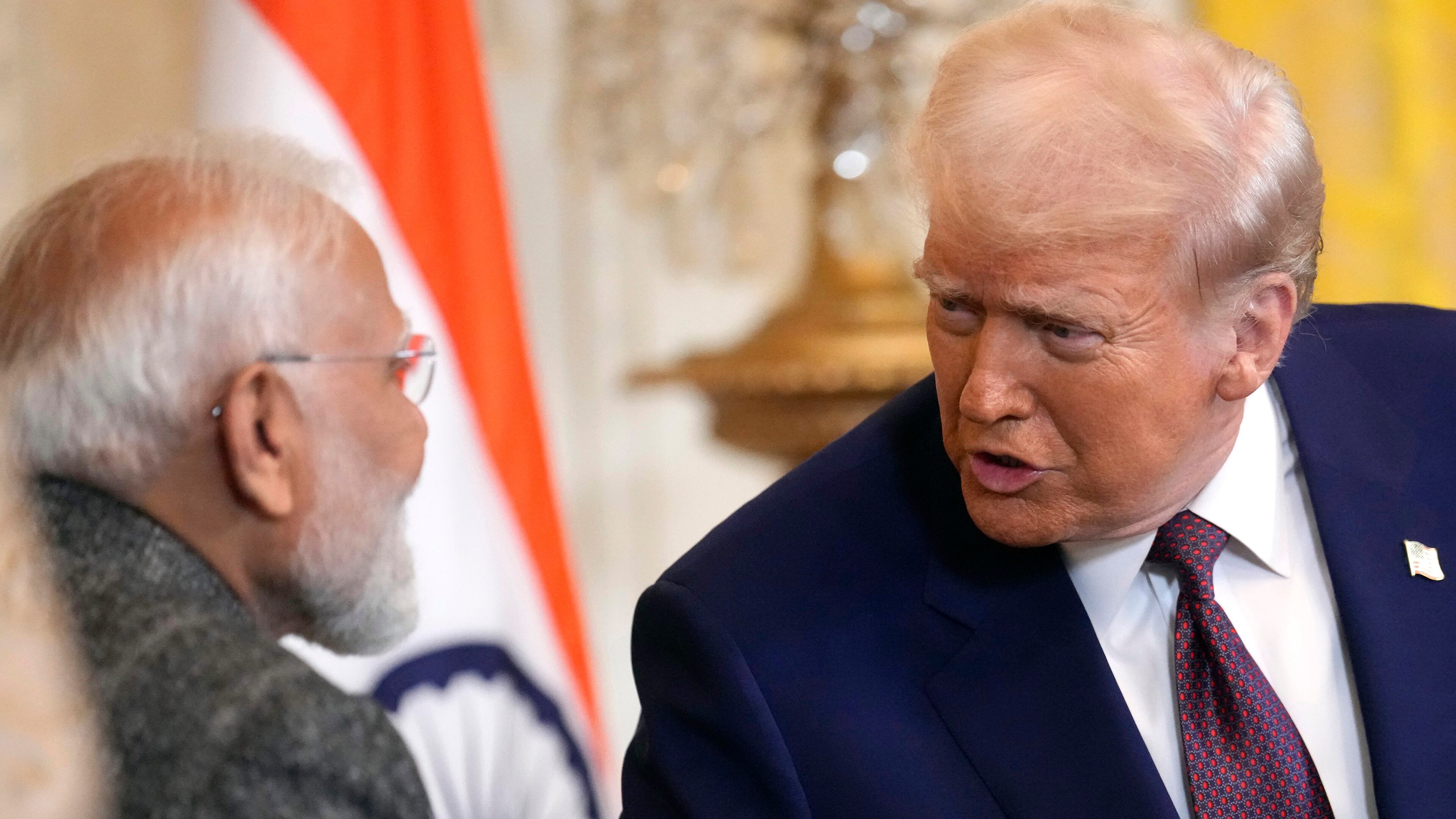 FILE - President Donald Trump, right, speaks with India's Prime Minister Narendra Modi during a news conference in the East Room of the White House, Feb. 13, 2025, in Washington. (AP Photo/Ben Curtis, File)