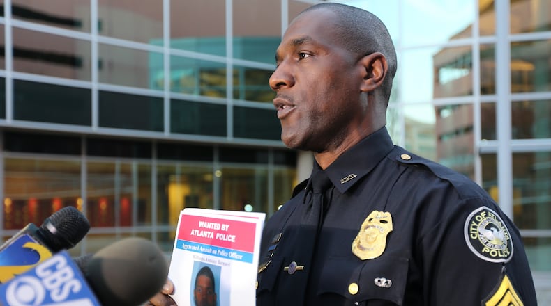 Atlanta Police Sgt. Warren Pickard holds a news conference Tuesday evening, Dec. 29, 2015 to announce that police were looking for Anthony Bernard Williams in connection with a police shooting that happened early Monday morning. (Ben Gray / bgray@ajc.com)