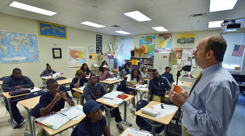 Raymond Maple teaches an AP U.S. History class at Southwest DeKalb High School. HYOSUB SHIN / HSHIN@AJC.COM