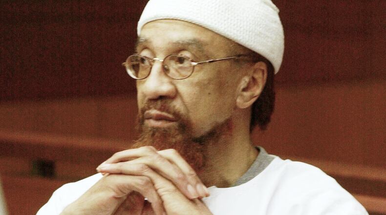 FILE - Jamil Abdullah Al-Amin watches during the sentencing portion of his trial in Atlanta, Monday, March 11, 2002. (AP Photo/Ric Feld, File)