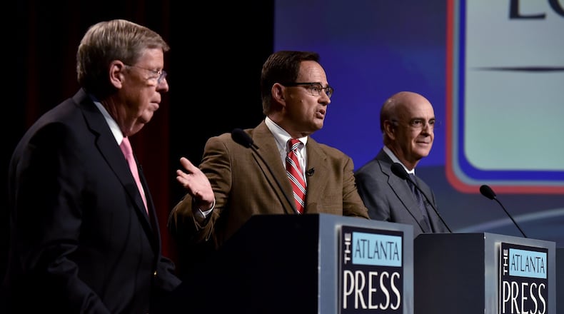 Left to right, U.S. Senate debate between incumbent Republican U.S. Sen. Johnny Isakson, Libertarian Allen Buckley and Democrat Jim Barksdale on Friday, Oct. 21, 2016 at Georgia Public Broadcasting. BRANT SANDERLIN/BSANDERLIN@AJC.COM