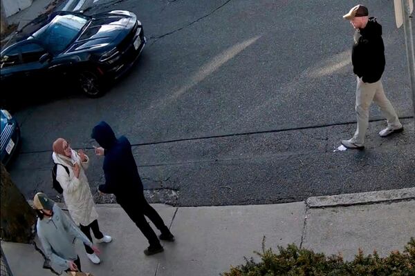 In this image taken from security camera video, Rumeysa Ozturk, a 30-year-old doctoral student at Tufts University, is detained by Department of Homeland Security agents on a street in Sommerville, Mass., Tuesday, March 26, 2025. (AP Photo)