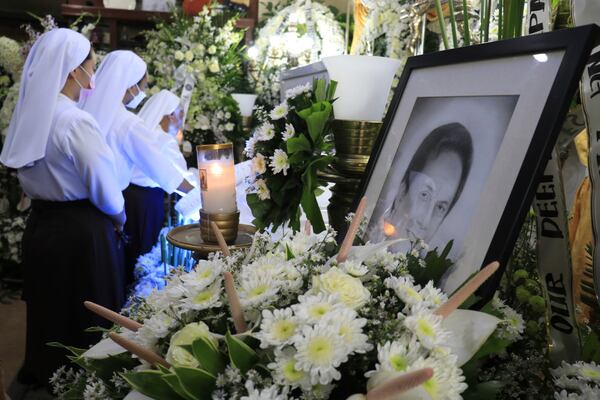 FILE - Catholic nuns visit the wake of Negros Oriental Gov. Roel Degamo at his home in Dumaguete city, central Philippines on March 6, 2023. (AP Photo/Alan Tangcawan, File)