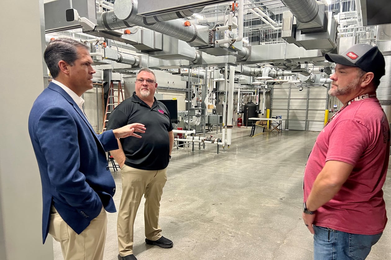 Former Lt. Gov. Geoff Duncan tours the training facility at Sheet Medal Workers Local 85 in Atlanta with union leaders Steve Langley (center) and Allen Still. (Patricia Murphy/AJC)