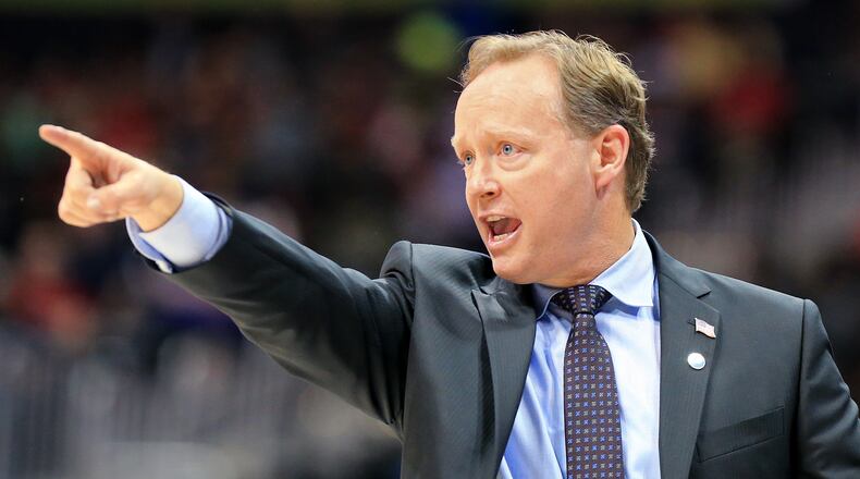Hawks head coach Mike Budenholzer points out a defensive set against the Pelicans during the second half in a basketball game on Wednesday, Nov. 11, 2015 in Atlanta. The Hawks beat the Pelicans 106-98. Curtis Compton / ccompton@ajc.com