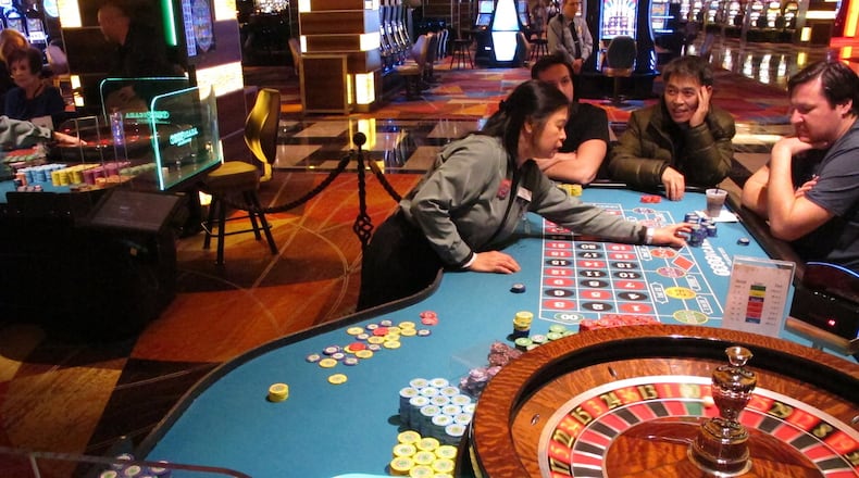 A dealer conducts a game of roulette at the Tropicana casino in Atlantic City, N.J. (AP Photo/Wayne Parry)