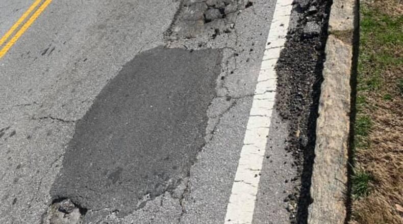 Charles Bohanan wants the potholes of Frazier Road fixed permanently. (Photo/Charles Bohanan).