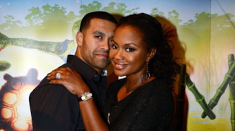 ATLANTA, GA - OCTOBER 26: "Real Housewives of Atlanta" cast member Phaedra Parks (right) and Apollo Nida attend Cirque du Soleil TOTEM Premiere at Atlantic Station on October 26, 2012 in Atlanta, Georgia. (Photo by Rick Diamond/Getty Images for Cirque du Soleil) Apollo Nida (left) may be facing significant prison time after pleading guilty to bank fraud and ID theft on May 6, 2014. His attorney made it clear that his wife Phaedra Parks (right) was not involved. CREDIT: Getty Images