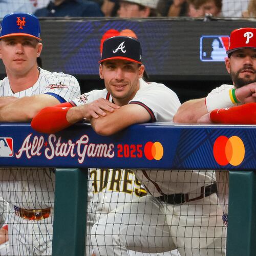 The National League's Matt Olson of the Atlanta Braves (center) stands between Pete Alonso of the New York Mets (left) and Kyle Schwarber of the Philadelphia Phillies (right) during the second inning of the MLB All-Star Game at Truist Park in Atlanta. (Jason Getz/AJC 2025)
