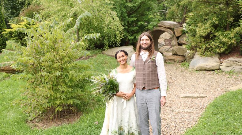 Didi and Taylor Morris met over cheese at the Tucker Farmers Market. The bride is a fiber artist, and hand-felted her gown for their 2018 wedding. Courtesy of George Harris