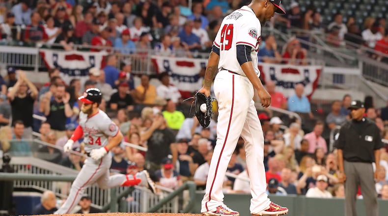 Washington Nationals’ Bryce Harper rounds third base after hitting a grand slam off Braves pitcher Julio Teheran. Curtis Compton/ccompton@ajc.com