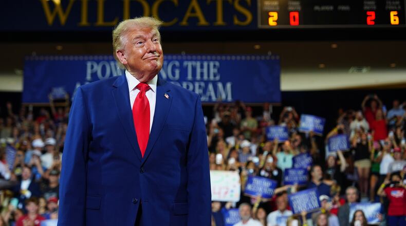 President Donald Trump appears on stage at Wheeler High School, Wednesday, July 22, 2026, in Marietta, Ga. (AP Photo/Julia Demaree Nikhinson)