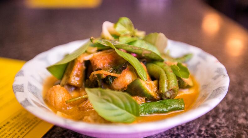 Talat Market serves a Thai red curry catfish with eggplant, rattlesnake beans, lime basil, ginger and pickled green tomatoes. / (Jenni Girtman/ Atlanta Event Photography)