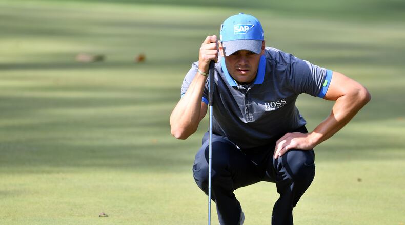 Matthew Fitzpatrick lines up a putt on the 10th green in the second round of the 81st Masters tournament at the Augusta National Golf Club on Friday. BRANT SANDERLIN / SPECIAL