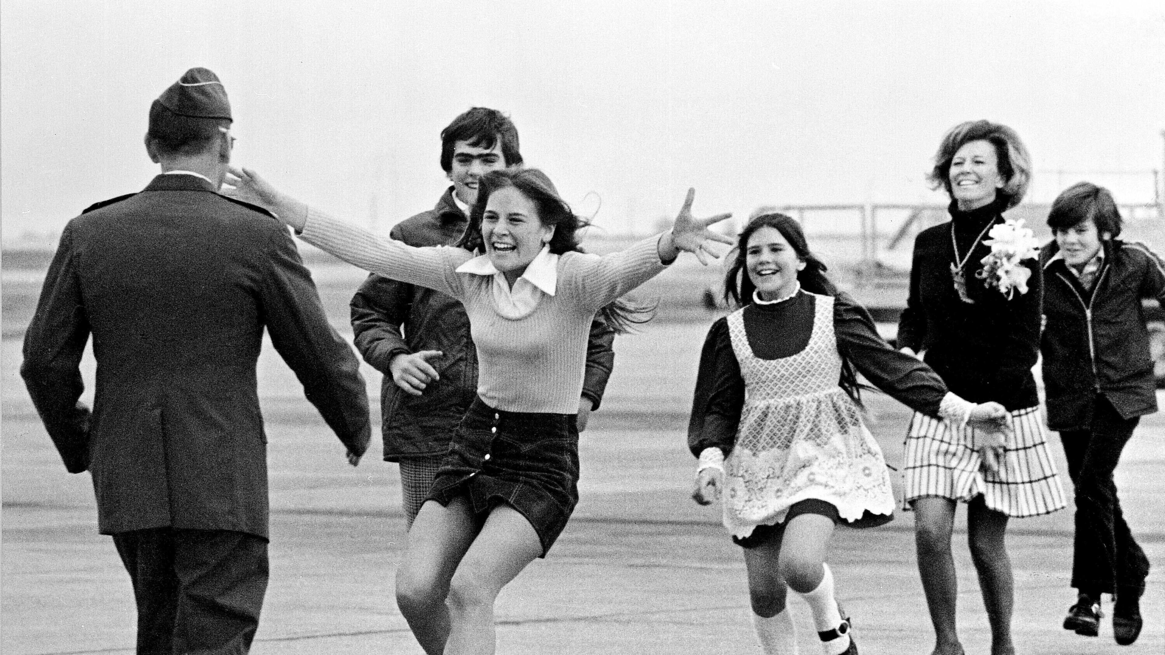 FILE - Released prisoner of war Lt. Col. Robert L. Stirm is greeted by his family at Travis Air Force Base in Fairfield, Calif., as he returns home from the Vietnam War, March 17, 1973. (AP Photo/Sal Veder, File)
