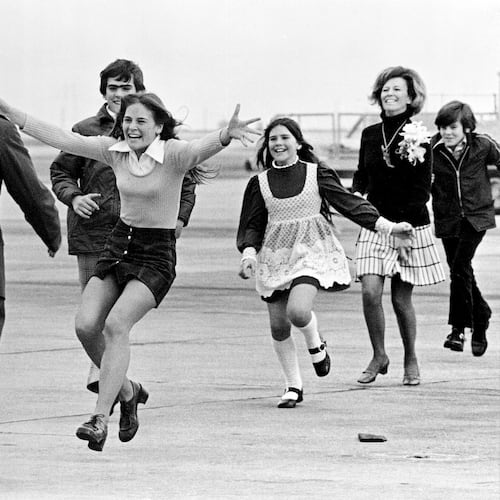 FILE - Released prisoner of war Lt. Col. Robert L. Stirm is greeted by his family at Travis Air Force Base in Fairfield, Calif., as he returns home from the Vietnam War, March 17, 1973. (AP Photo/Sal Veder, File)