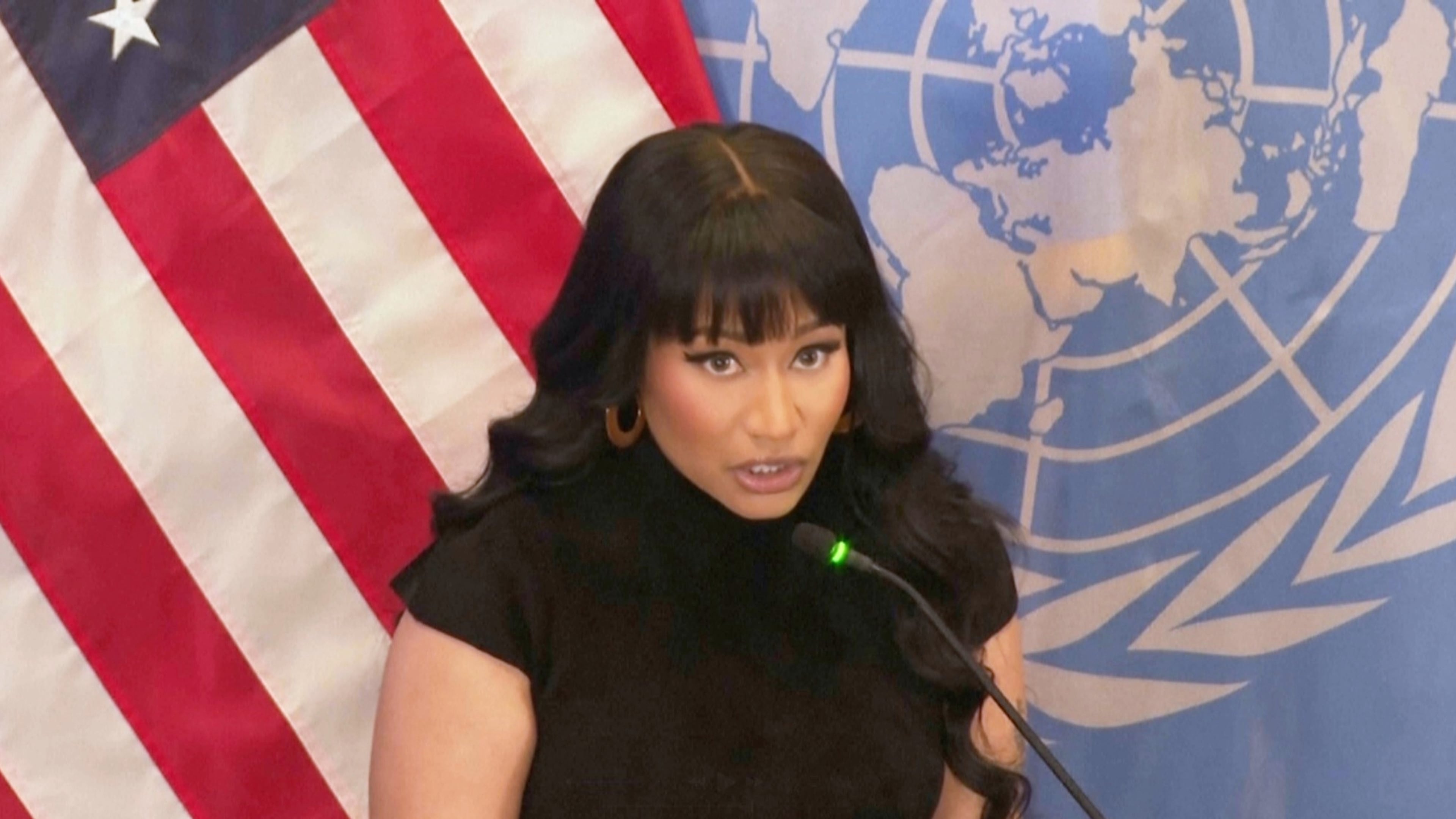In this image taken from video, pop star Nicki Minaj joined faith leaders Tuesday Nov. 18, 2025, at the United Nations headquarters to lend support for protecting religious freedom, and addressing the rising levels of violence toward Christians in Nigeria. Minaj was invited to speak at the US mission to the United Nations by U.S. Ambassador Mike Waltz. (AP Photo/Joseph B. Frederick)