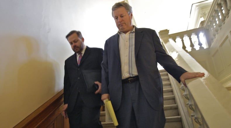 Former state Sen. Don Balfour, right, with attorney Robert Highsmith, in 2012 heads down the steps to the Senate mezzanine meeting room for an ethics hearing. BOB ANDRES / BANDRES@AJC.COM