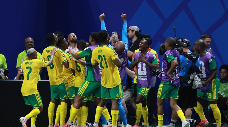 South Africa players celebrate Teboho Mokoena tying the game with a penalty kick during the second half against Czechia in the World Cup at Atlanta Stadium on Thursday, June 18, 2026. (Jason Getz/AJC)