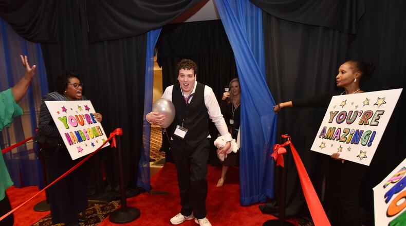 For people with special needs, a free Night to Shine Prom is scheduled on Feb. 9 at Dunwoody United Methodist Church, 1548 Mt. Vernon Road, Dunwoody by the Tim Tebow Foundation. On Feb. 8, 2020, Jason Reynolds reacts on the red carpet as volunteers cheer for him during the “Night to Shine” event at the First Baptist Church of Atlanta, also in Dunwoody. HYOSUB SHIN / HSHIN@AJC.COM
