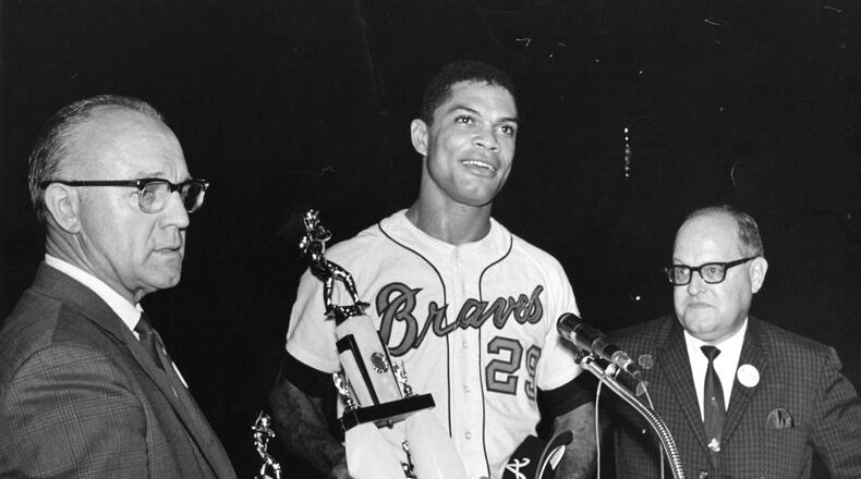 Officials from the Braves' 400 Club present Felipe Alou with a trophy in 1966 (AJC file photo)