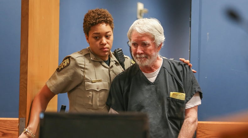 June 6, 2017 Atlanta: Fulton County deputy, K. Jackson brings Claud "Tex" McIver into the courtroom. McIver was arraigned for murder on Tuesday, June 6, 2017. JOHN SPINK/JSPINK@AJC.COM.