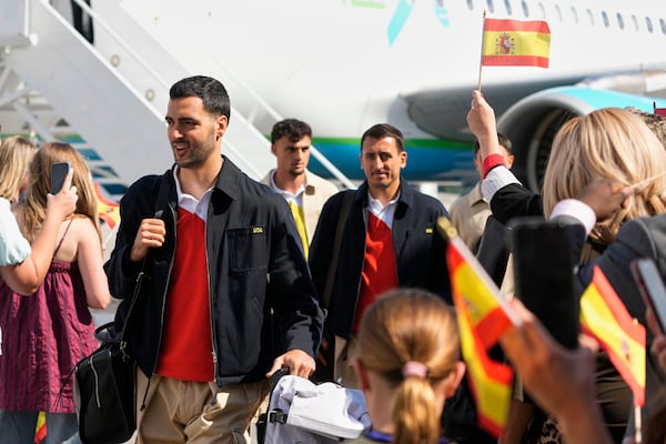 Spain midfielder Mikel Merino and teammates arrive in Chattanooga before the World Cup. (AP Photo/George Walker IV)