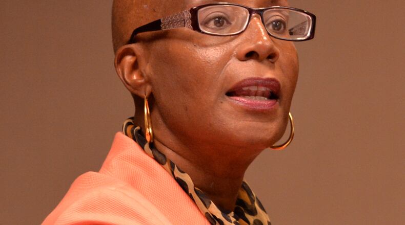 When this photo was taken during Donna Edler's reinstatement hearing on July 16, 2013, she was undergoing chemotherapy.