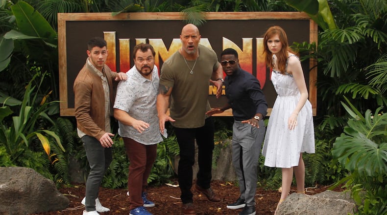 Nick Jonas, from left, Jack Black, Dwayne Johnson, Kevin Hart and Karen Gillan during a promotional photo for "Jumanji: Welcome to the Jungle." Image: Shane Tergarden/Sony Pictures