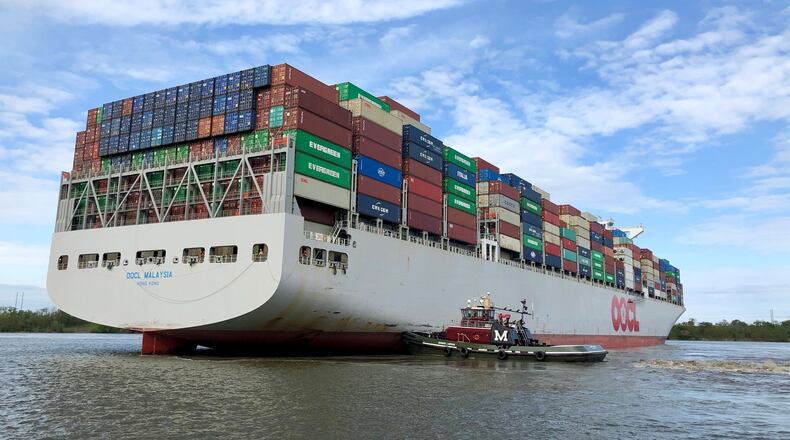 A river pilot craft guides the OOCL Malaysia freighter to a bearth at the Port of Savannah on March 26, 2018. J. Scott Trubey/strubey@ajc.com