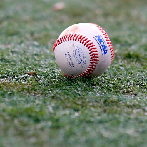 FILE - The NCAA logo is seen on a baseball during an NCAA college baseball tournament regional game between Louisiana-Lafayette and Mississippi State in Lafayette, La., June 2, 2014. (AP Photo/Jonathan Bachman, File)
