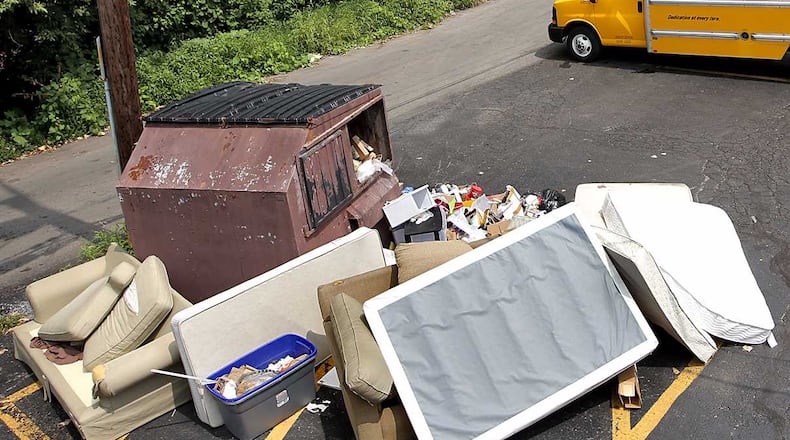Clayton County considering "trash amnesty" days to clean up community.