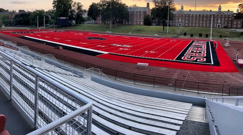 Clark Atlanta University's football program replaces its aging turf with a new red one, thanks to a grant from the Blank Family Foundation.