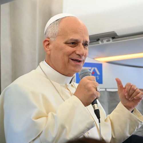 Pope Leo XIV talks to reporters aboard an aircraft on his way to Beirut, Lebanon, Sunday, Nov. 30, 2025. (Andreas Solaro/Pool Via AP)