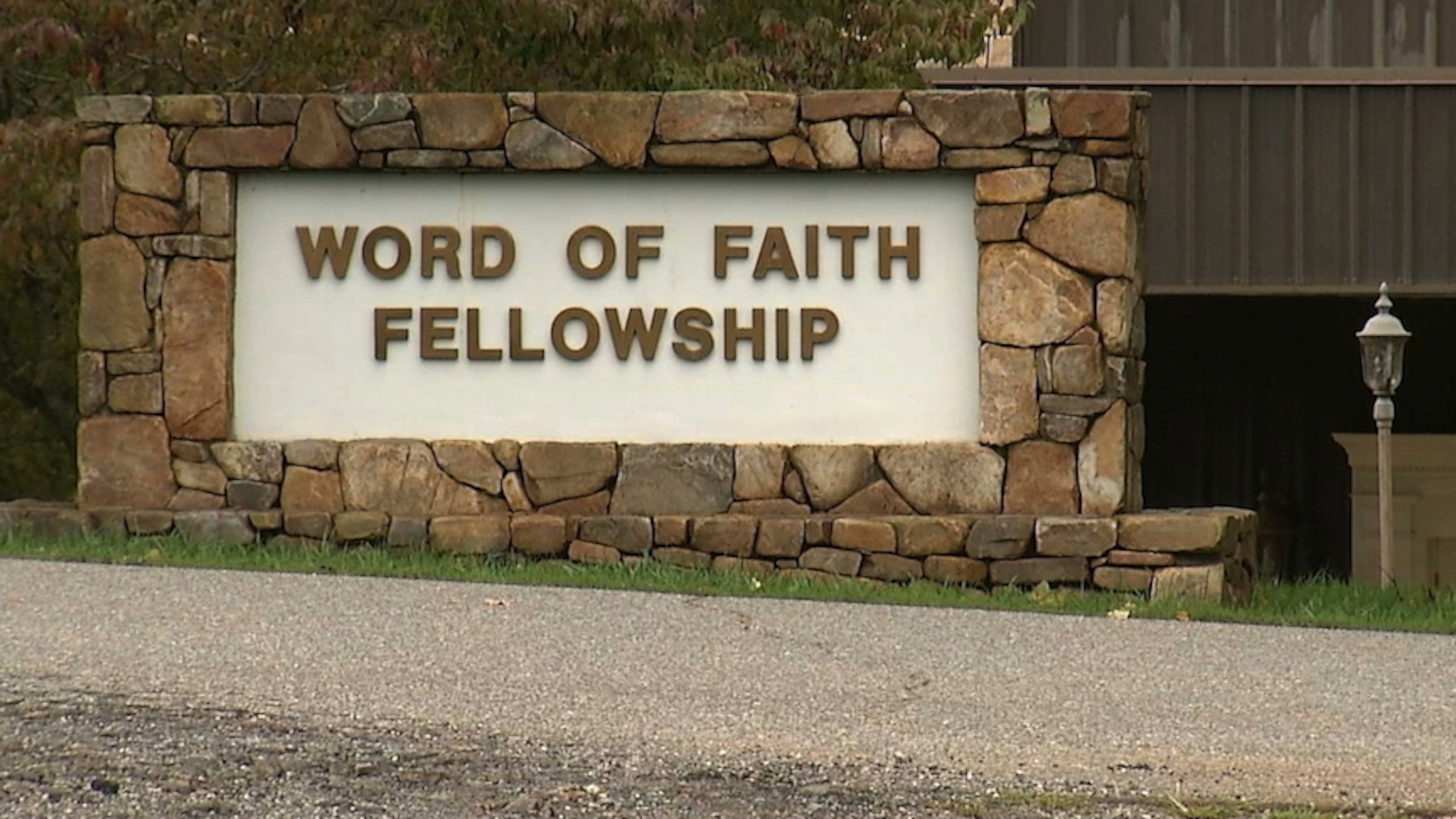 FILE - This 2016 image from video shows the entrance to the Word of Faith Fellowship church in Spindale, N.C. (AP Photo/Alex Sanz, File)