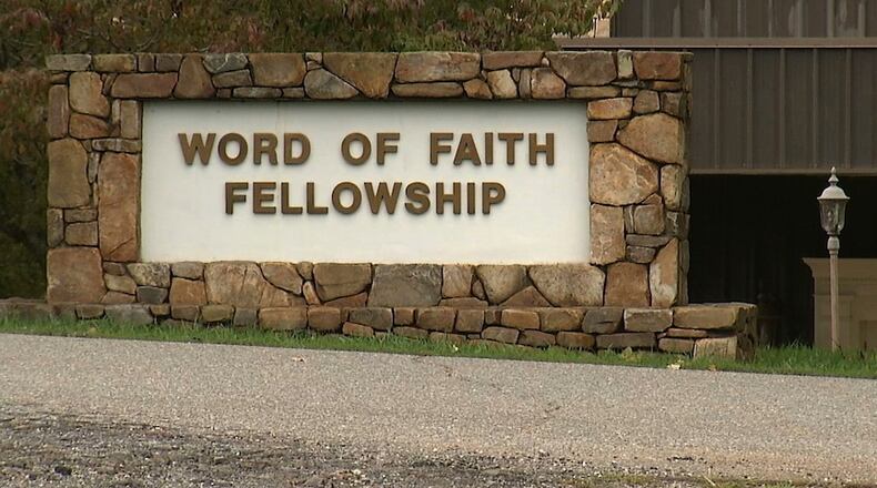 FILE - This 2016 image from video shows the entrance to the Word of Faith Fellowship church in Spindale, N.C. (AP Photo/Alex Sanz, File)