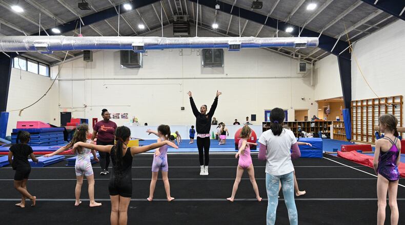 Gina White former owner of Phoenix Gymnastics taught classes at Hammond Park Gymnasium. (Hyosub Shin / Hyosub.Shin@ajc.com)
