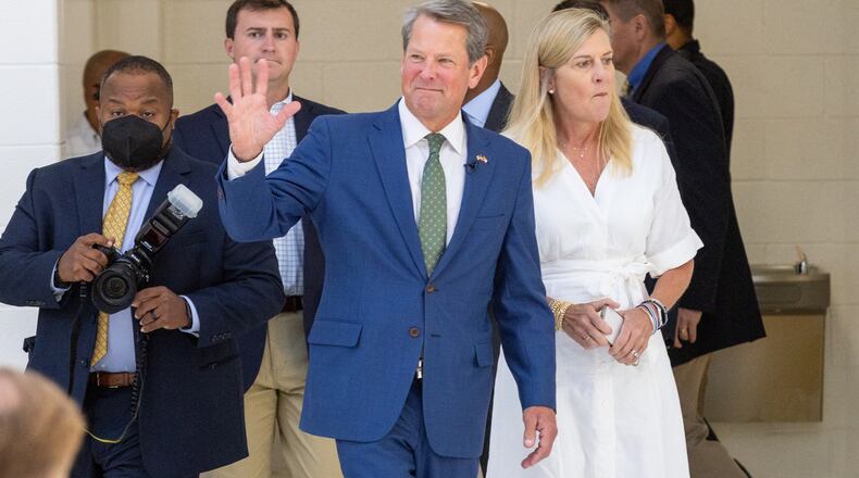 Governor Brian Kemp and First Lady Marty Kemp greet supporters before a press conference at Ola High School in Henry County on Friday, July 29, 2022. (Steve Schaefer / steve.schaefer@ajc.com)
