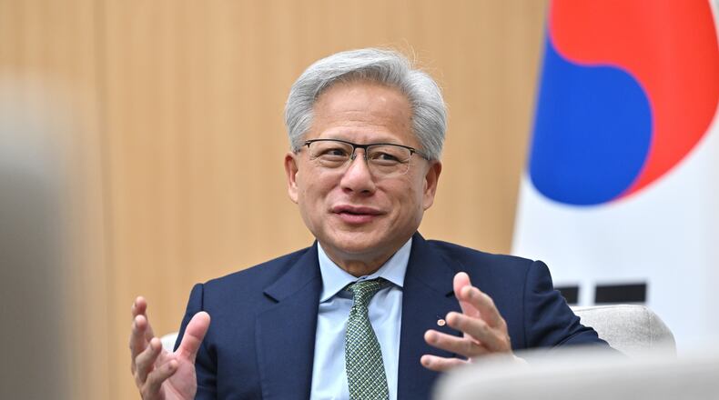 Nvidia CEO Jensen Huang meets with South Korean President Lee Jae Myung on the sidelines of the Asia-Pacific Economic Cooperation (APEC) summit in Gyeongju, South Korea Friday, Oct. 31, 2025. (Jung Yeon-je/Pool Photo via AP)