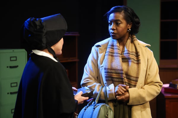 Eileen Land (left) plays Sister Aloysius and Jessica Wise plays Mrs. Mueller during a cue-to-cue rehearsal of “Doubt: A Parable." Mueller is the mother of the student who Father Flynn is suspected of having an inappropriate relationship with. (Abbey Cutrer/AJC)
