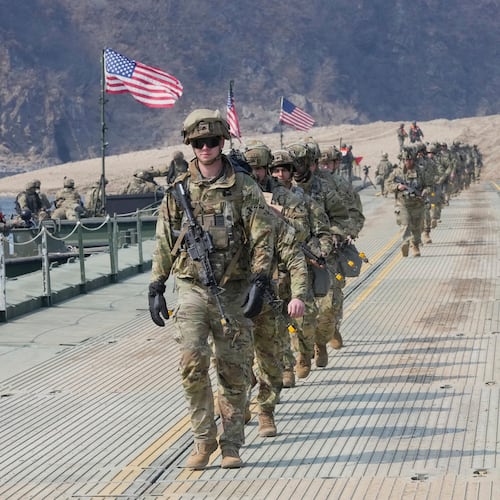 FILE - U.S. Army soldiers cross a floating bridge on the Imjin River during a joint river-crossing exercise between South Korea and the United States as a part of the Freedom Shield military exercise in Yeoncheon, South Korea, March 20, 2025. (AP Photo/Ahn Young-joon, File)