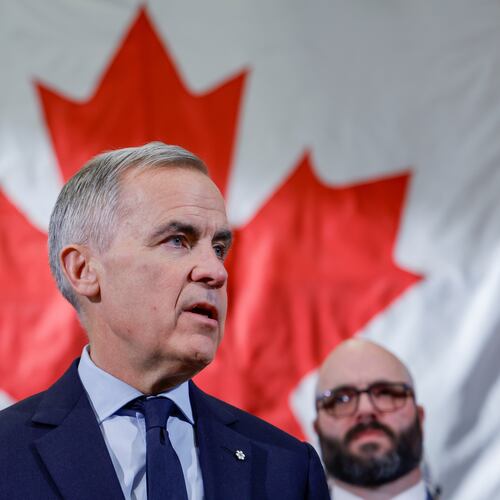 Prime Minister Mark Carney meets with ironworkers in Calgary, Alta., Thursday, Nov. 27, 2025. (Jeff McIntosh /The Canadian Press via AP)
