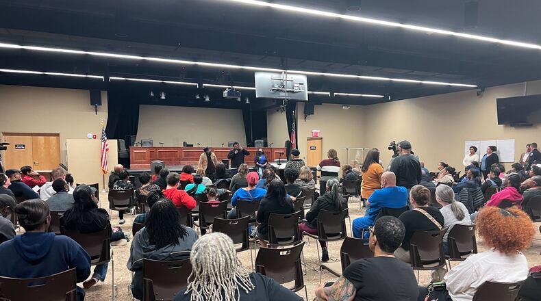 Community members gather Feb. 8 at Patricia C. Vaughn Cultural Arts Center in Powder Springs to discuss safety concerns and possible solutions in the wake of a shooting at McEachern High School in Cobb County.