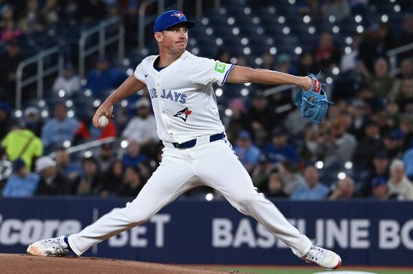 Toronto Blue Jays starting pitcher Chris Bassitt (40) throws to an Atlanta Braves batter in the first inning of an interleague baseball game in Toronto, Wednesday, April 16, 2025. (Jon Blacker/The Canadian Press via AP)