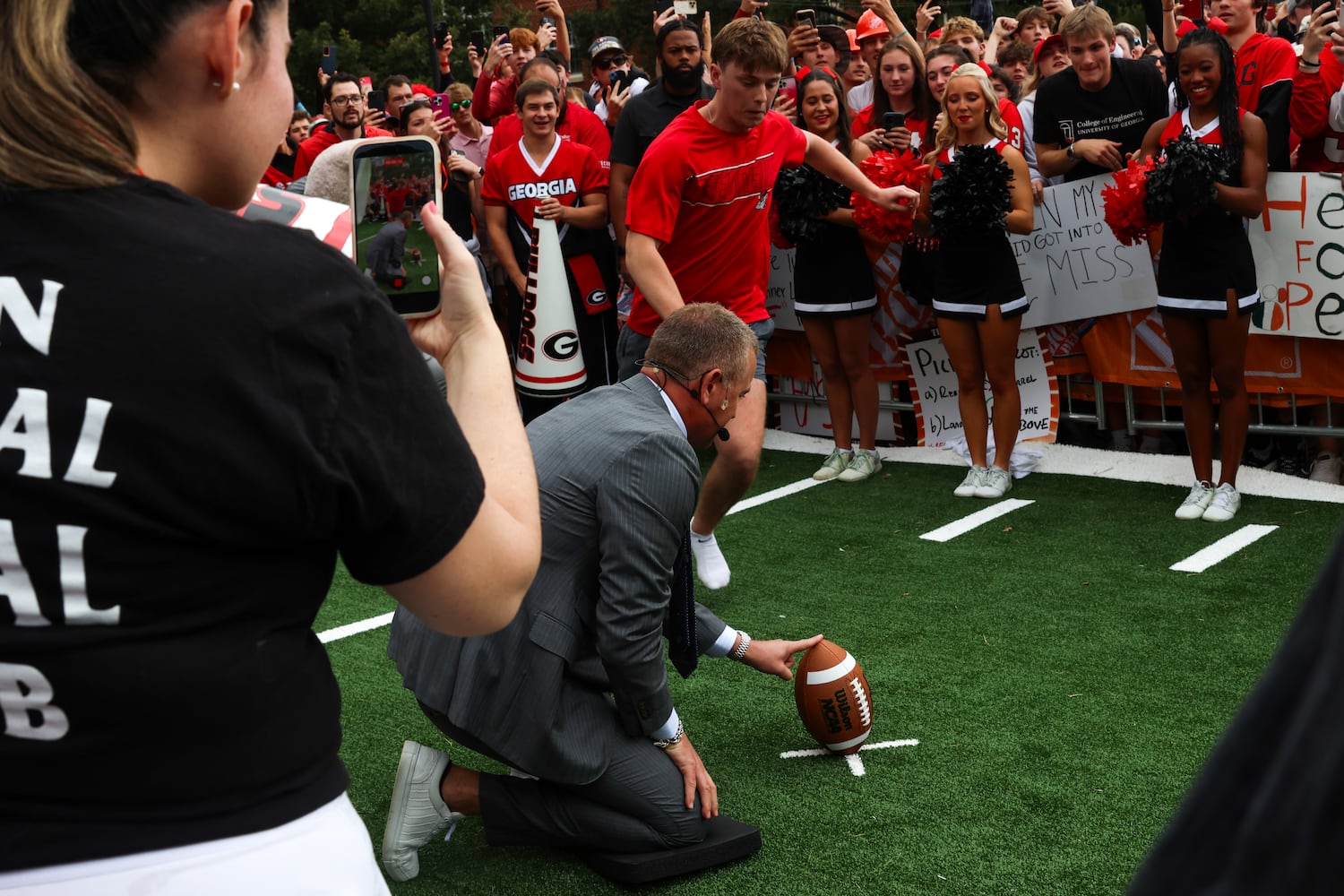 Ben Guymon competes for $100,000 during Pat McAfee’s Kicking Contest during the ESPN College GameDay broadcast from Myers Quad at UGA on Saturday, Oct. 18, 2025. Guymon missed on his first try but made a second kick during the commercial break. (C.J. Bartunek for the AJC)

