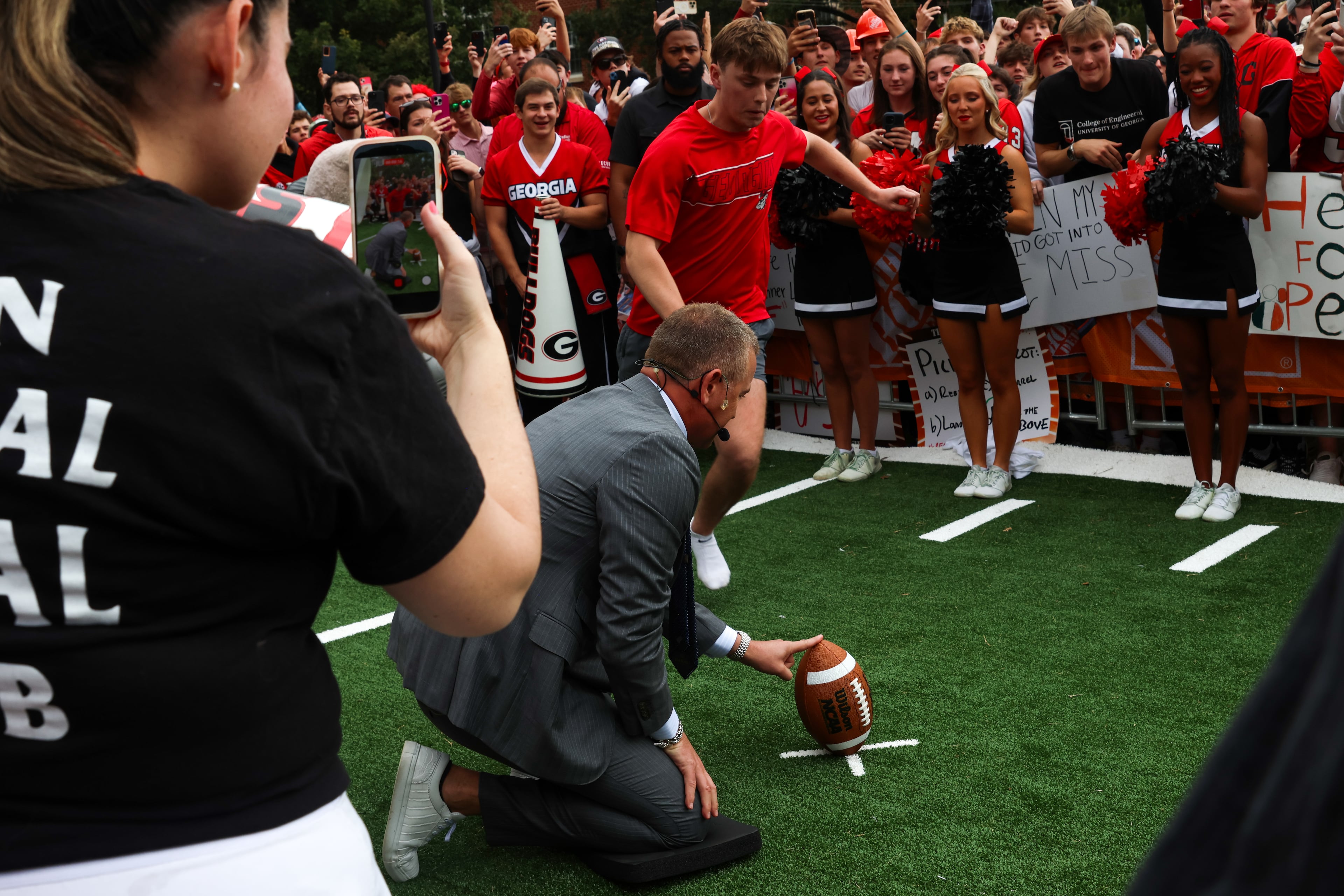 Ben Guymon competes for $100,000 during Pat McAfee’s Kicking Contest during the ESPN College GameDay broadcast from Myers Quad at UGA on Saturday, Oct. 18, 2025. Guymon missed on his first try but made a second kick during the commercial break. (C.J. Bartunek for the AJC)